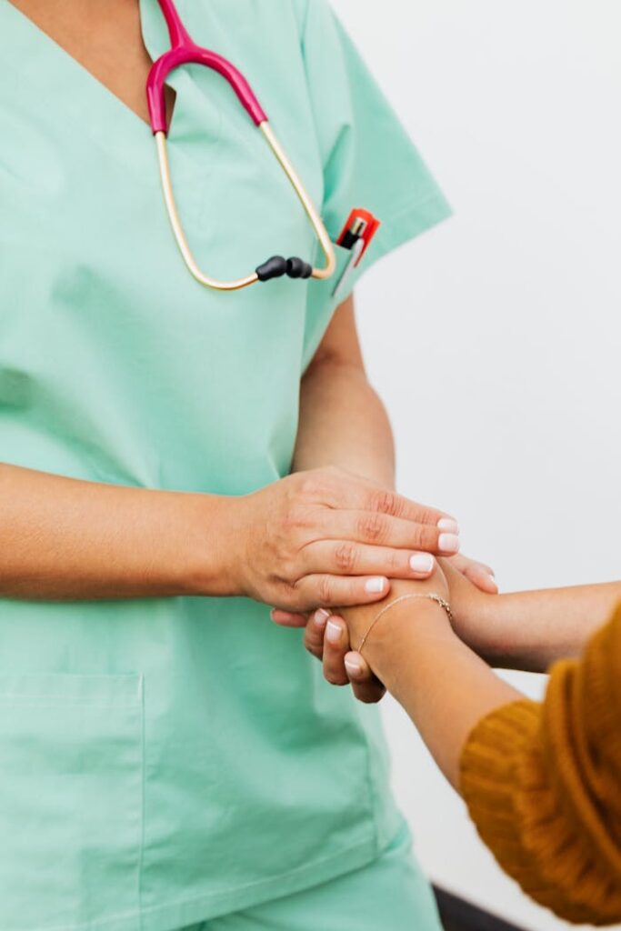 zipwp-image-5207015 A Nurse and Patient Doing Handshake
