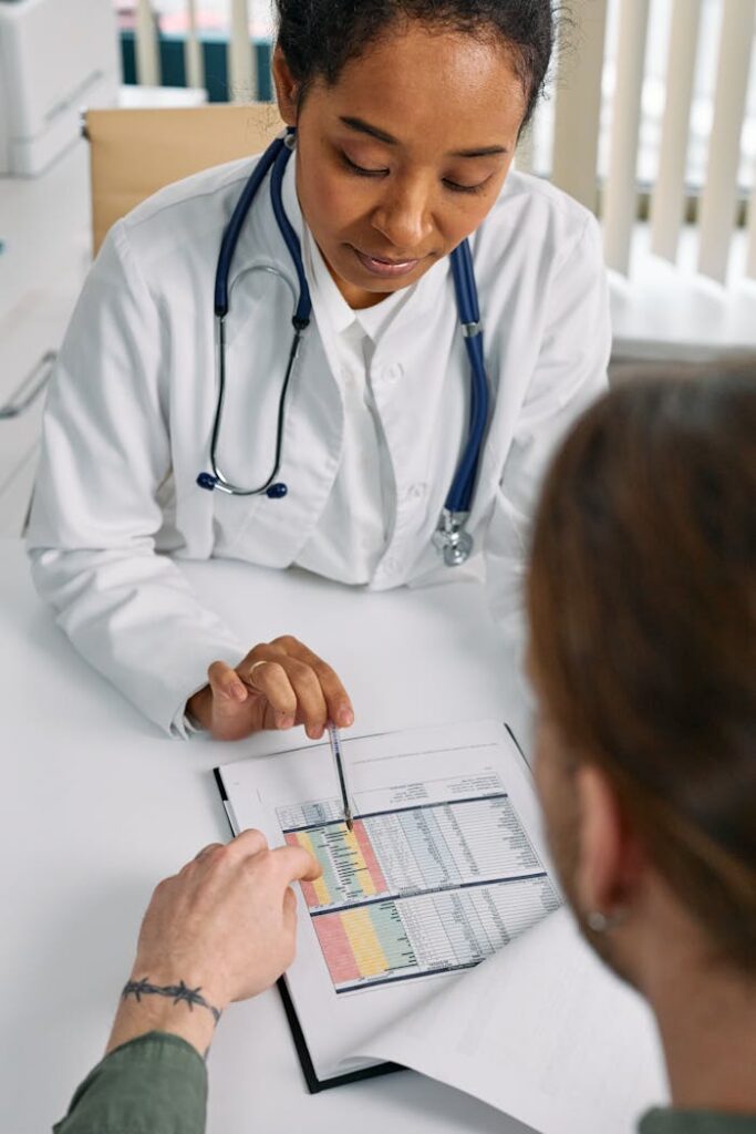 zipwp-image-7578808 A Medical Practitioner Showing a Patient Paper